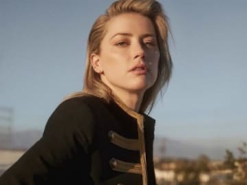 Captan a Amber Heard comprando en tienda de ropa barata