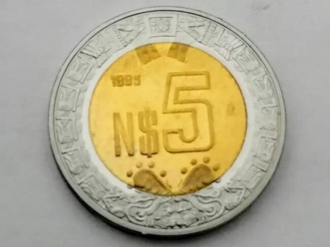 Moneda de cinco pesos se vende hasta en tres mil en Mercado Libre