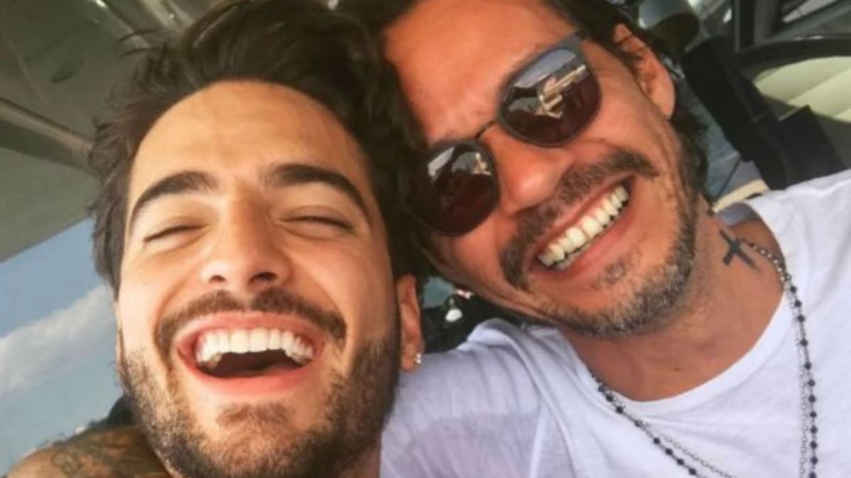 Marc Anthony le roba tremendo beso a Maluma