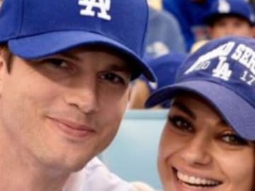 Mila Kunis y Ashton Kutcher se besan con pasión para Kiss Cam