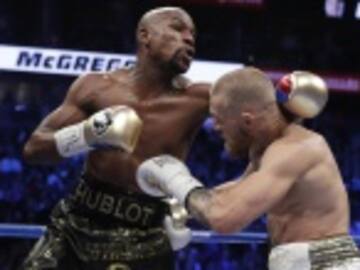 Mayweather se impuso en el choque de disciplinas