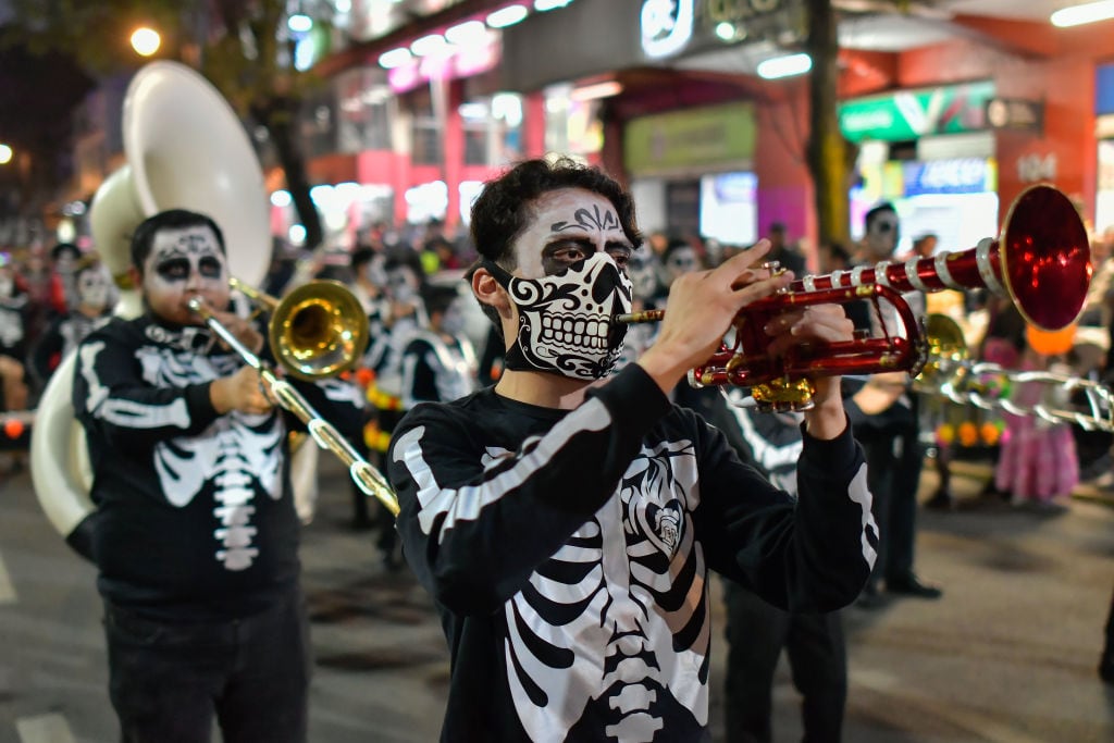 People dresseded as Catrinas and Catrines took to the historic center of Toluca to participate in the traditional of the Day of the Dead parade. Arturo Hernandez/Getty Images.