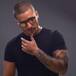 Marc Anthony le roba un beso a Maluma