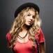 Fergie presenta su nuevo disco con candentes fotos